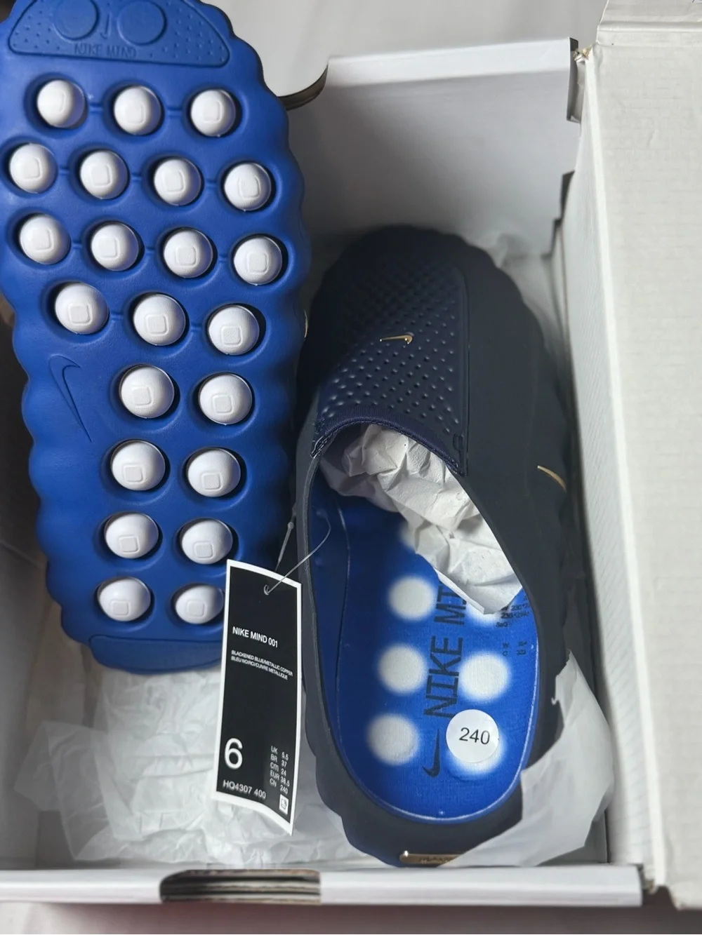 Nike Men's Navy and Blue Slide Sandals with Gold Swoosh